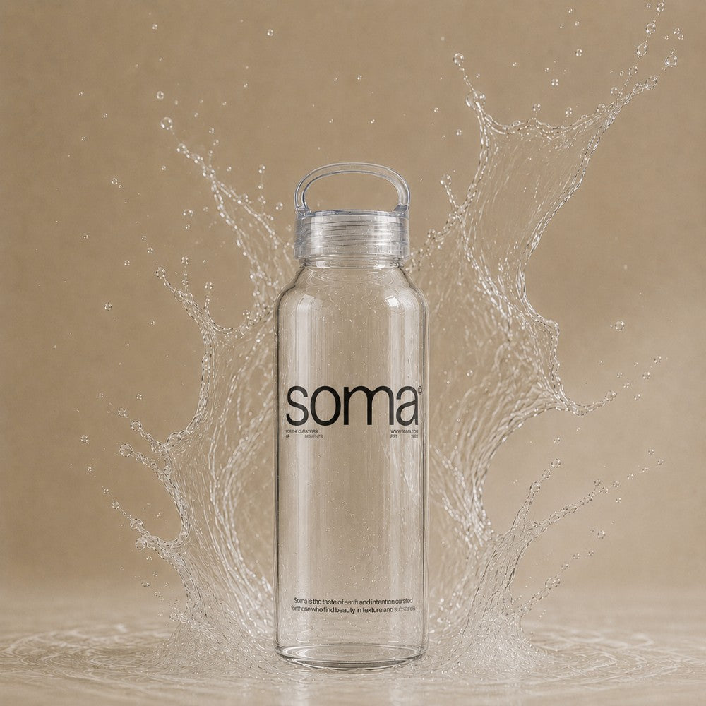 500ml logo glass bottle on beige background with water splashing - Just Bottle