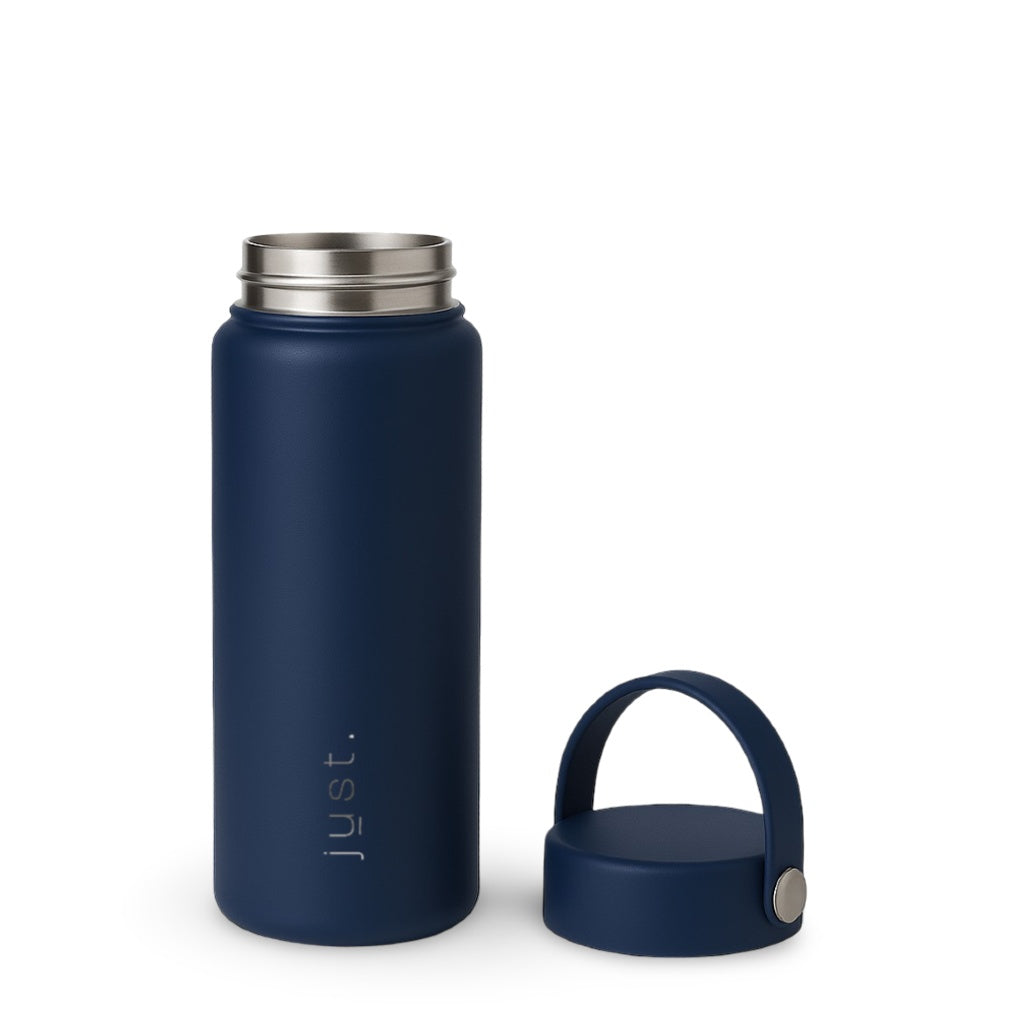 dark blue bottle next to lid with handle