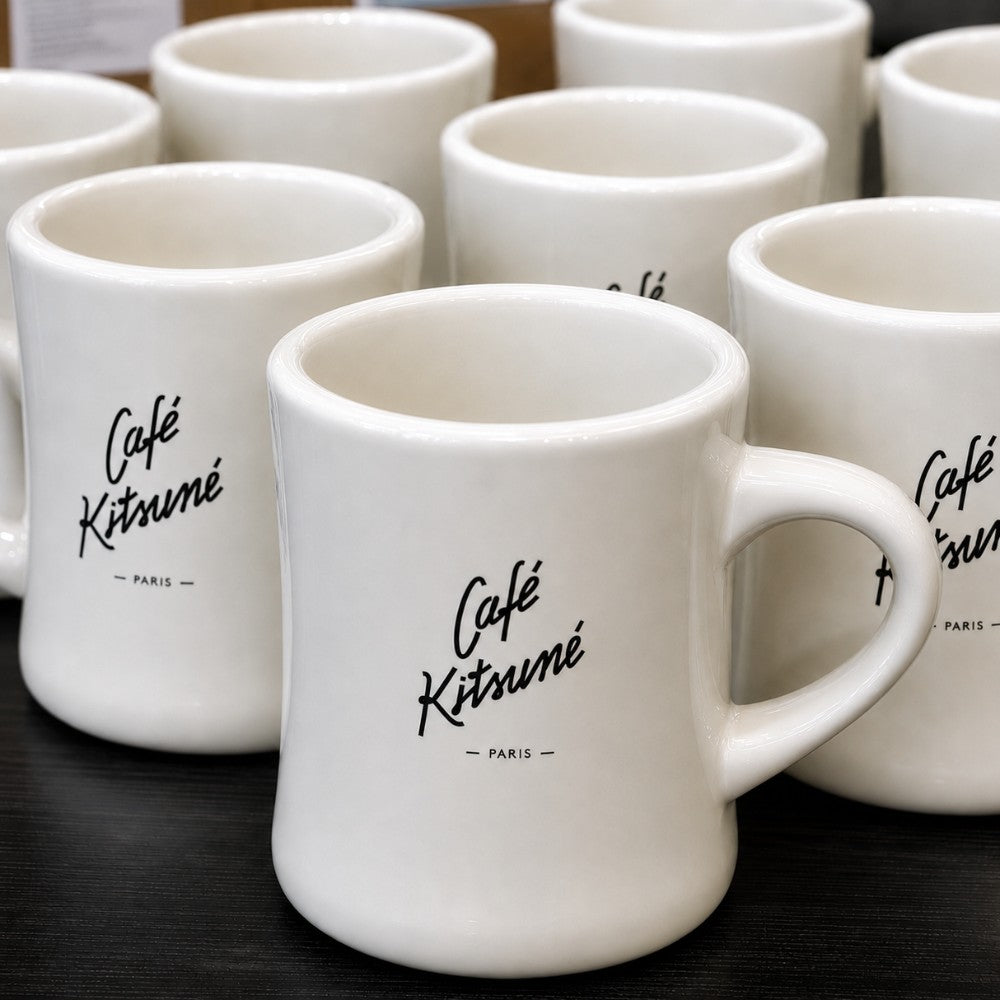 Custom logo classic diner mugs on a black wooden table