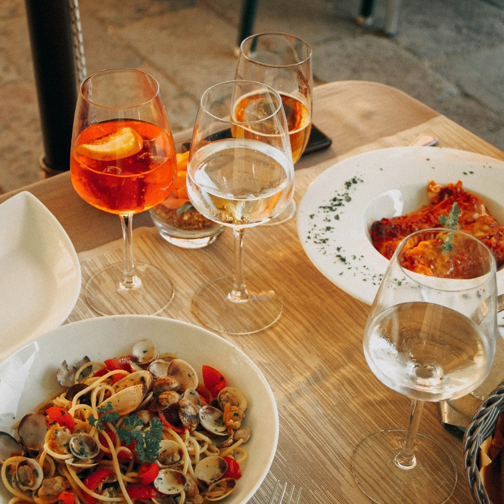aperol spritz with pasta dish