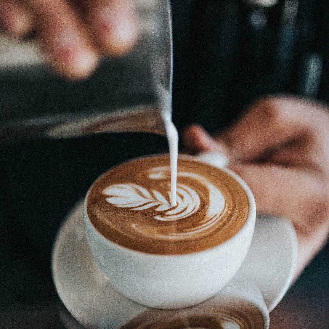 latte art on dark chocolate mocha