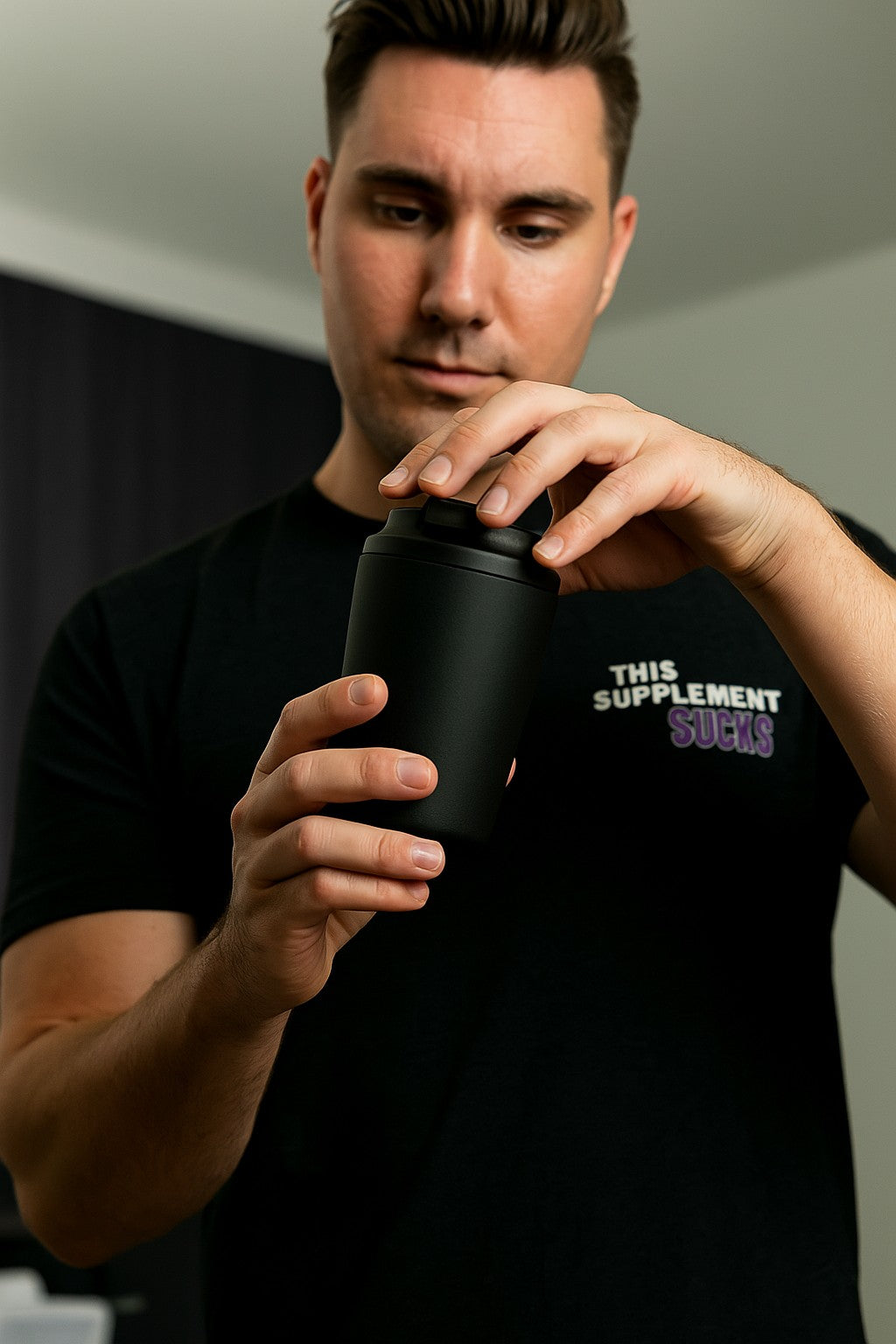 barista holding a 12oz (350ml) reusable coffee cup - vacuum insulation