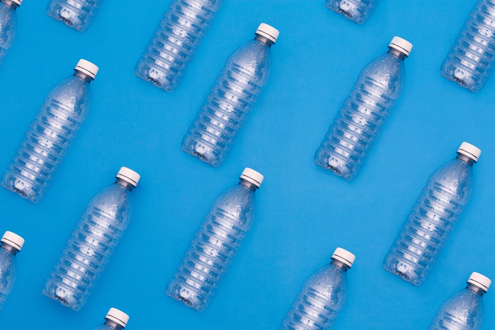 plastic bottles on blue background