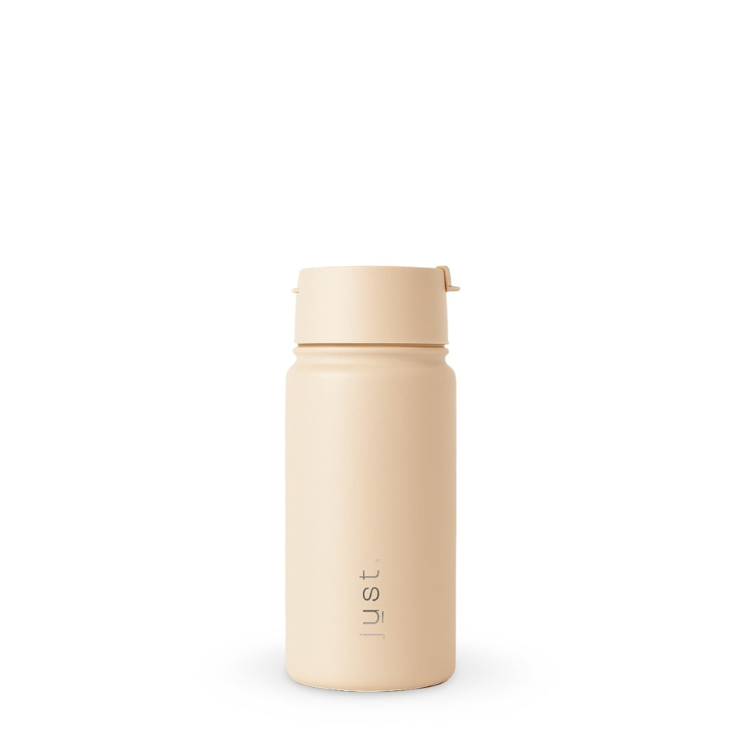 Insulated travel coffee mug in sand beige, front view
