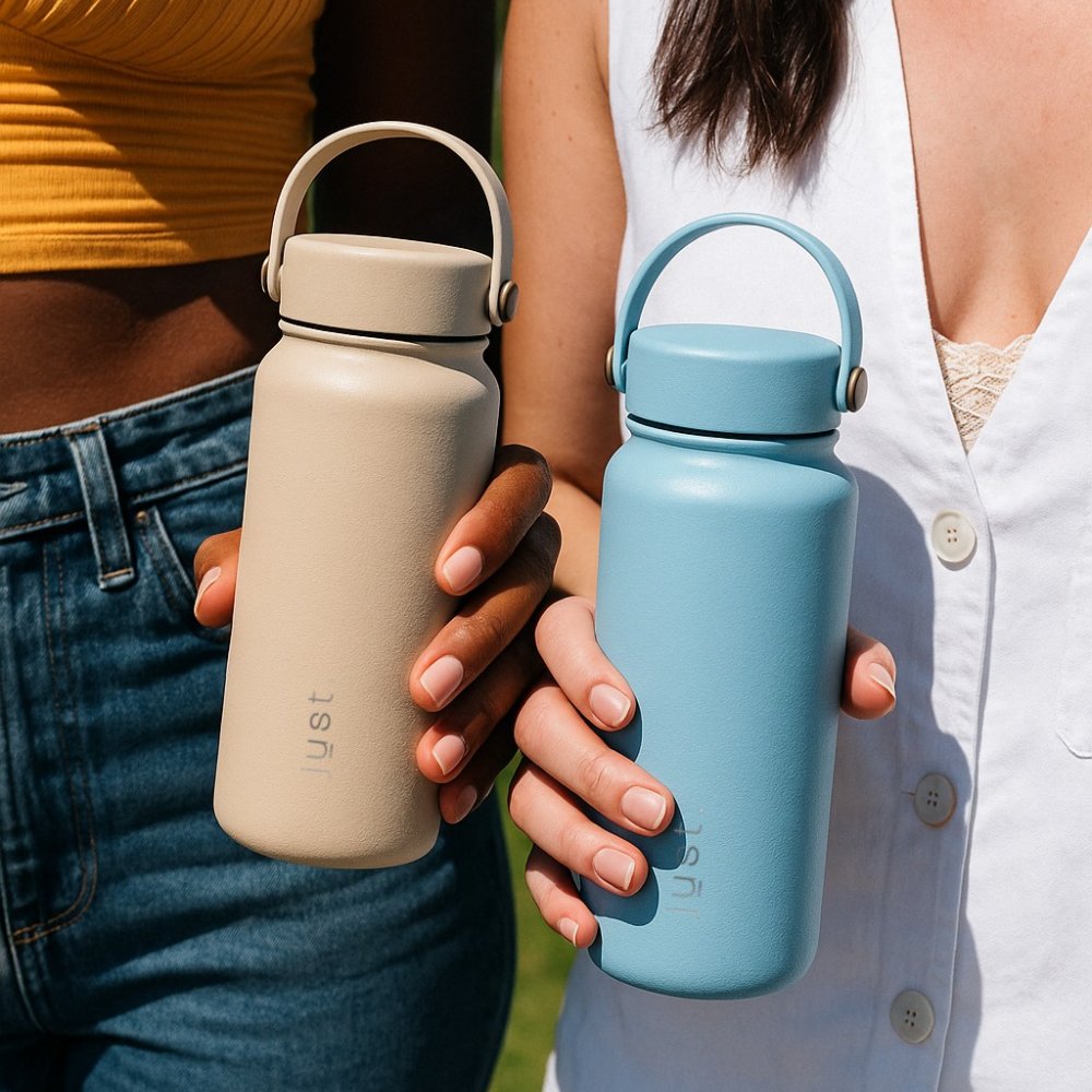 Two people holding a beige and a blue Just Bottle eco friendly water bottles