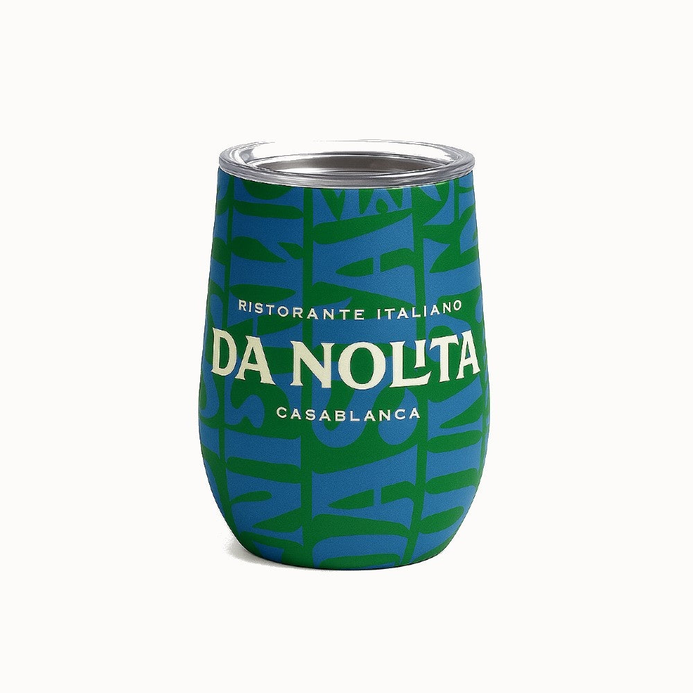 Green wine tumbler with 'Da Nolita' wrap around branding on a white background