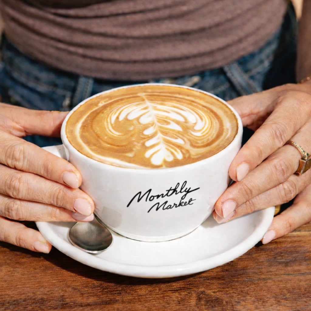 350ml custom logo cafe cup on a table with latte art