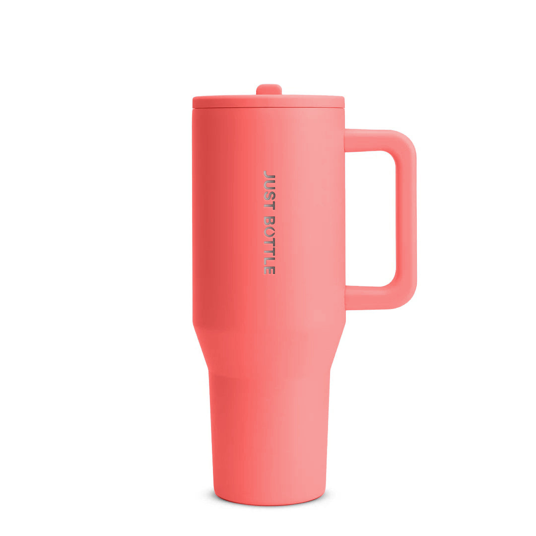40oz insulated tumbler with straw lid in coral orange, front view
