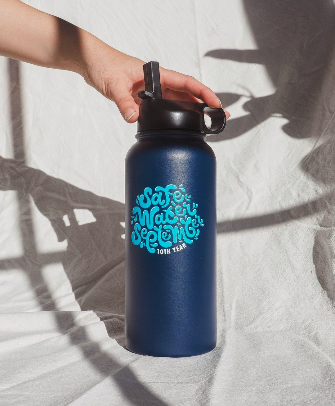 custom water bottle with safe water September logo