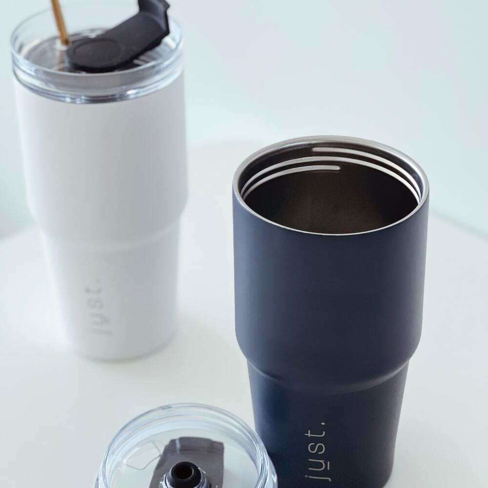 Just bottle stainless steel everyday tumbler blue and white on a table