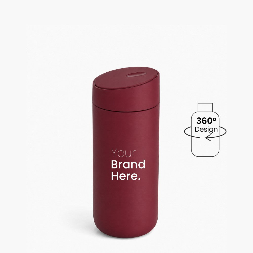 Dark red custom logo stainless steel travel tumbler with "your brand here", front view on a white background