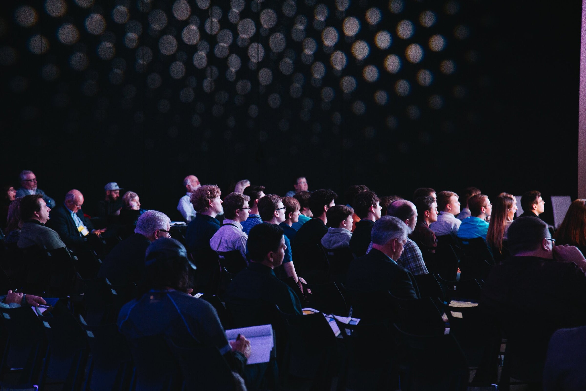 people sitting down at an event
