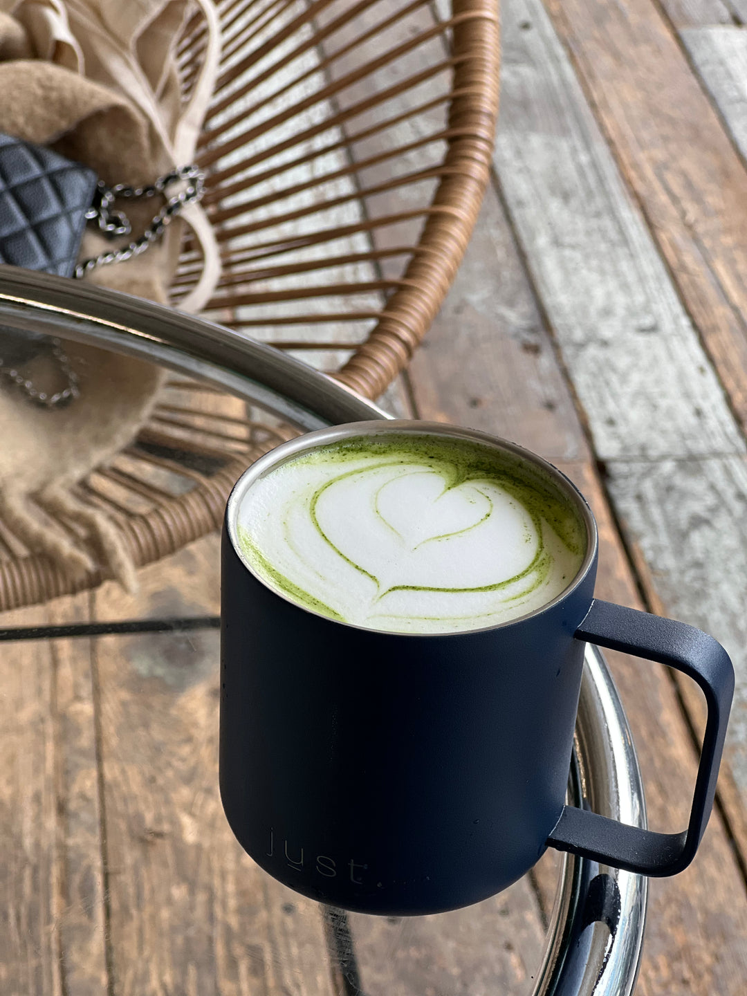 blue reusable coffee mug with matcha latte