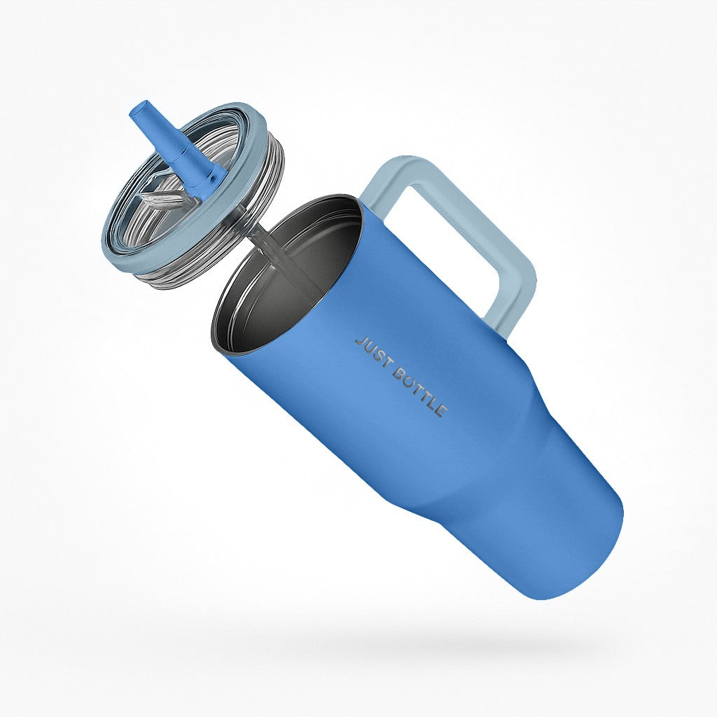 40oz insulated tumbler with straw lid side view in light blue with grey handle
