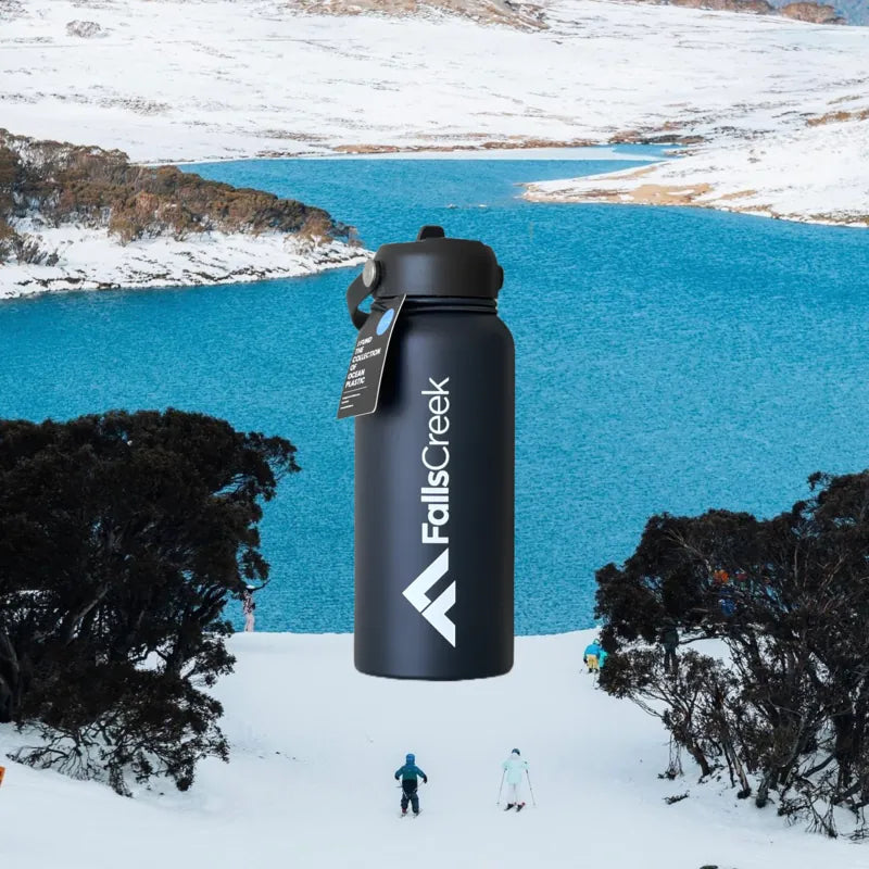 blue custom logo water bottle in the snow