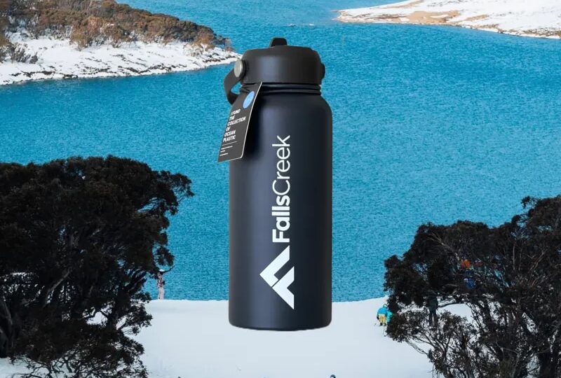 blue custom branded bottle in the snow