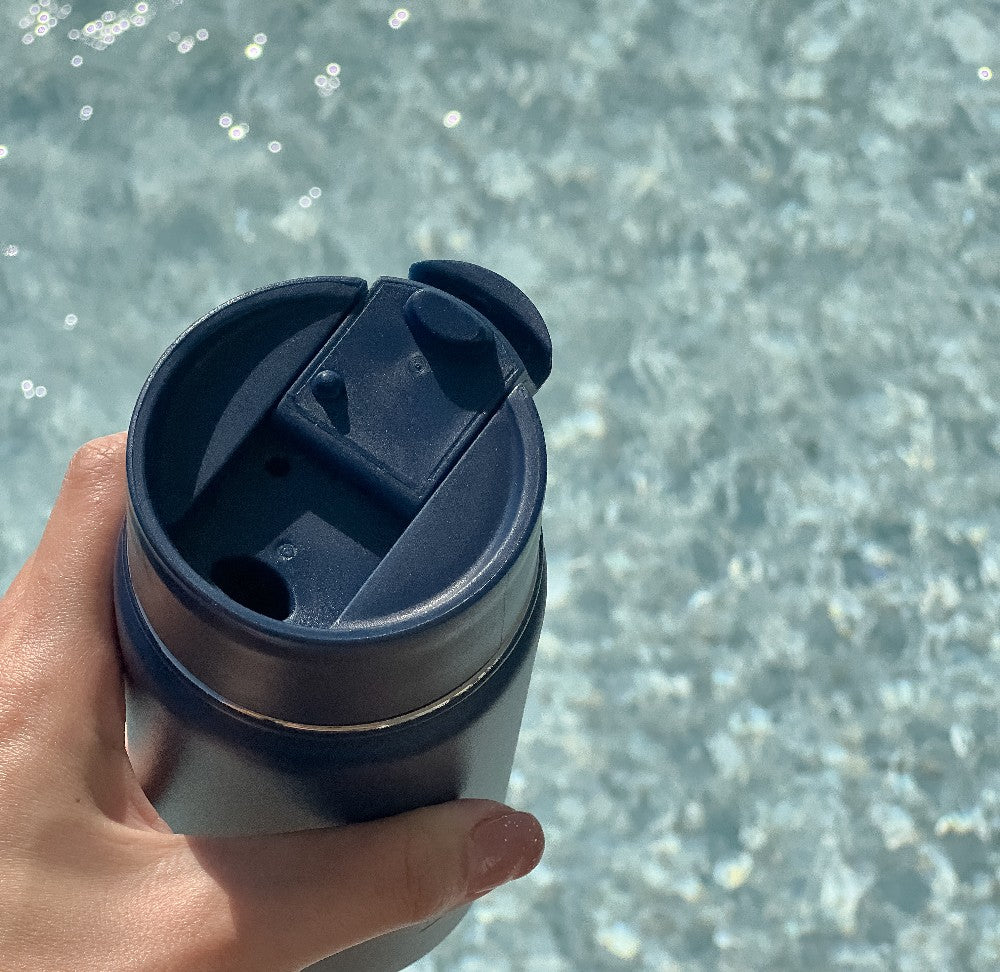 keep cup lid next to swimming pool