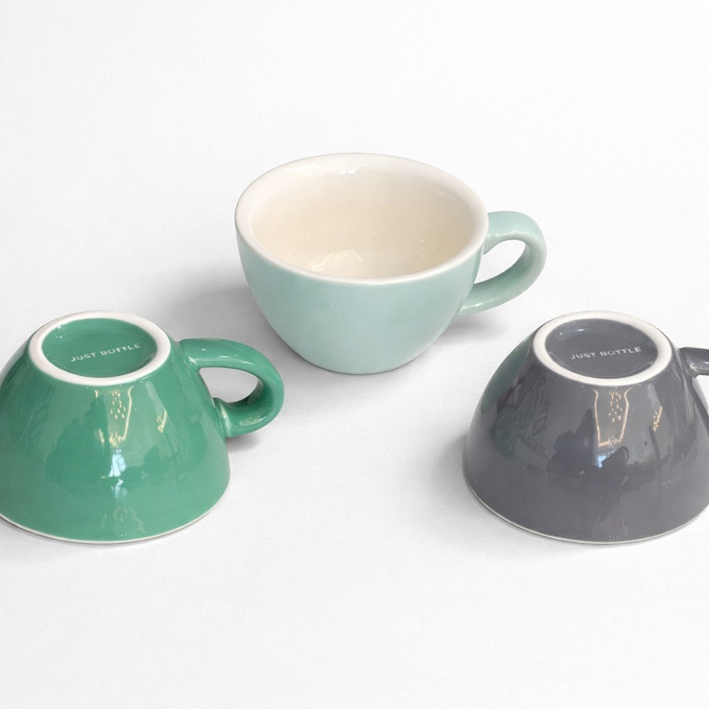 Set of Just Bottle cafe cups on a white background
