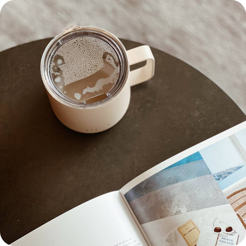 beige reusable coffee mug