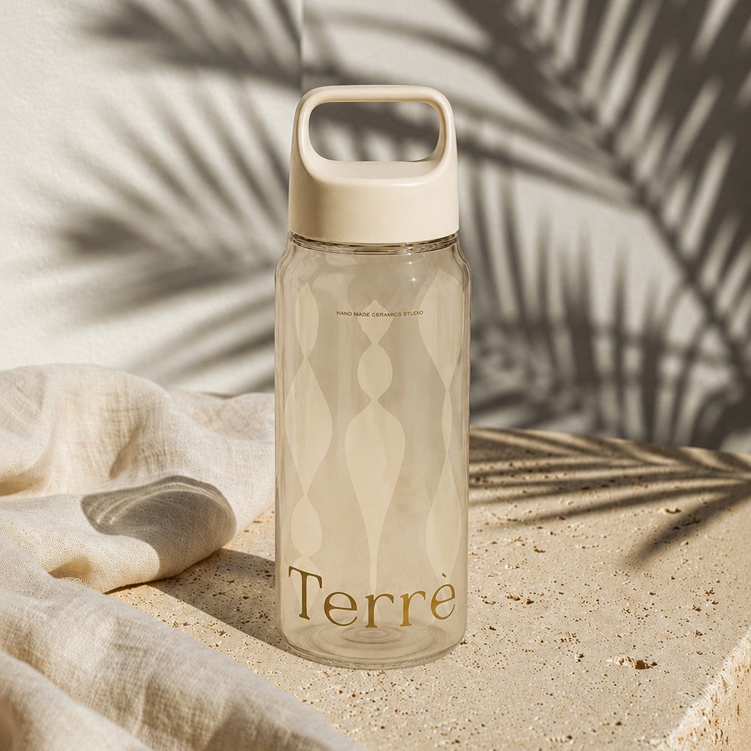 rpet water bottle with wrap around printing on a stone with a neutral background
