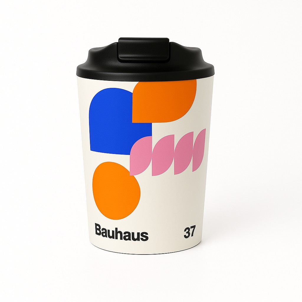 Colorful travel mug with Bauhaus design on a white background